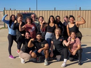 tip . Members working out in a group class